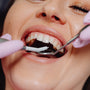 Woman at dentist for bleeding gums