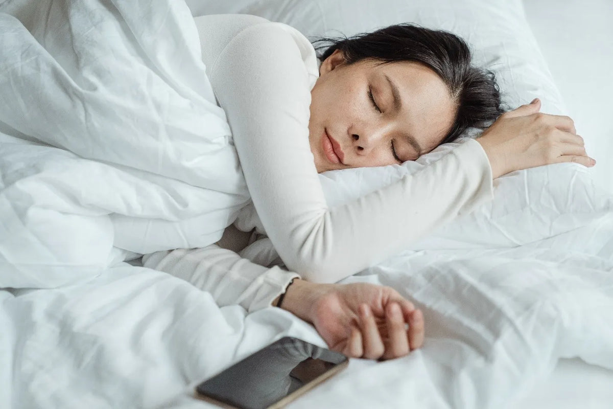 girl sleeping who may be suffering from sleep apnea