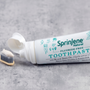 Fluoride vs. Fluoride-Free Toothpaste - SprinJene